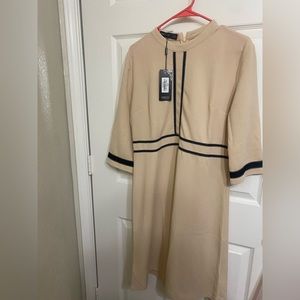 Beige and black work dress